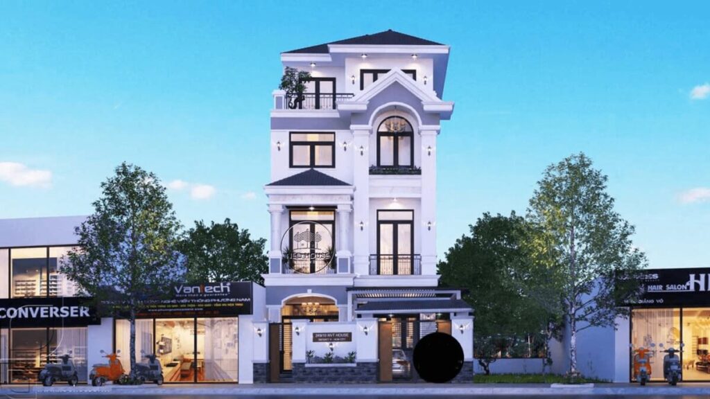 Biệt thự ba tầng sang trọng với thiết kế hiện đại, xung quanh là cửa hàng và cây xanh, bầu trời trong xanh.