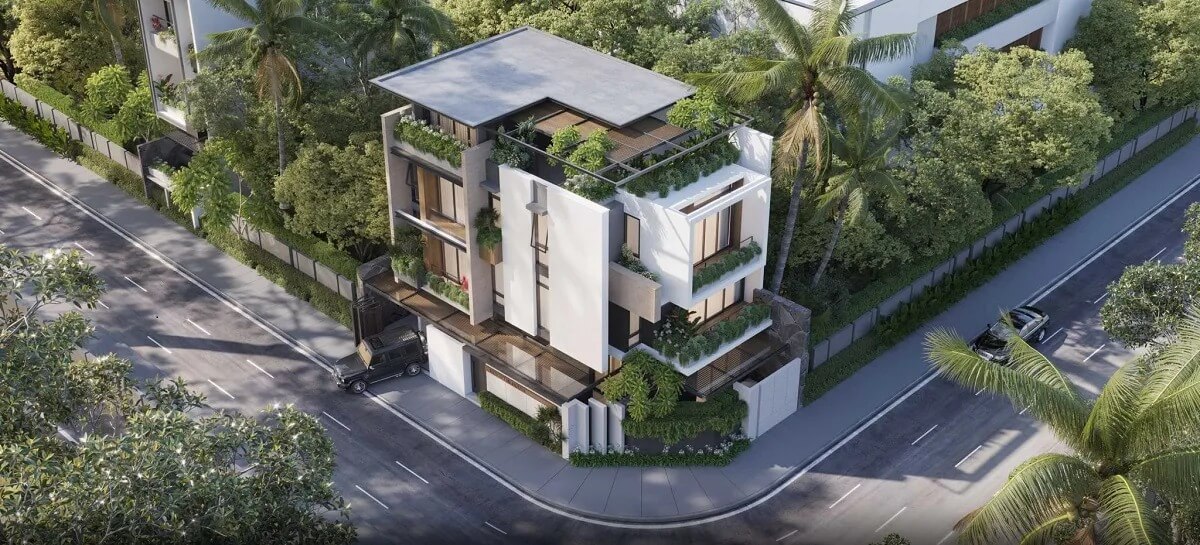 Biệt thự xanh hiện đại với nhiều cây cối bao quanh, góc nhìn từ trên cao, kết nối với đường phố yên tĩnh.