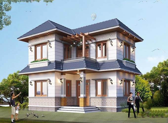 Ngôi nhà hai tầng mái thái hiện đại với sân vườn xanh mát, có người đi bộ xung quanh trong khung cảnh thiên nhiên.