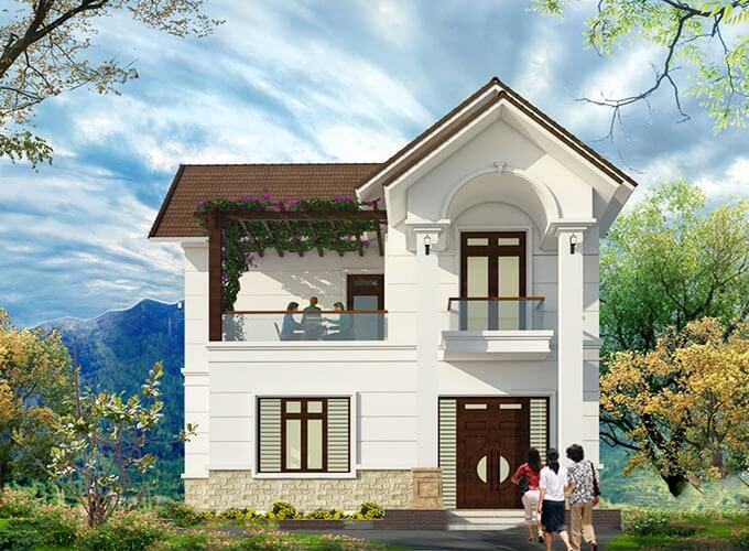 Ngôi nhà 2 tầng màu trắng với mái nâu, ban công rộng và cây xanh xung quanh.