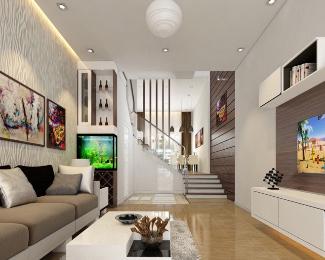 Phòng khách hiện đại với sofa nâu, bể cá và cầu thang gỗ, đèn trần trắng và tranh treo tường màu sắc.