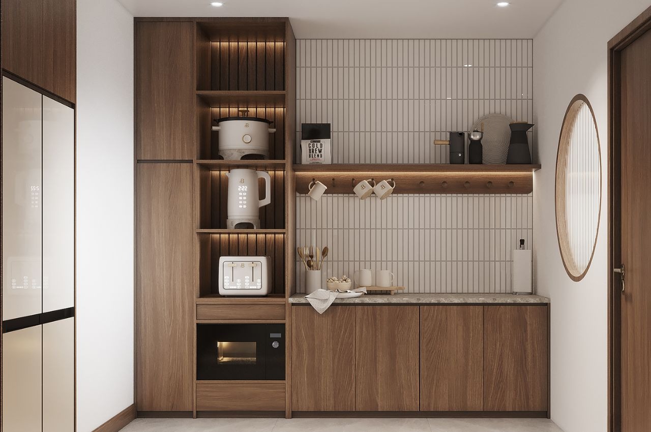 Nhà bếp hiện đại với tủ gỗ, thiết bị điện tử và kệ treo cốc, trang trí phong cách tối giản.