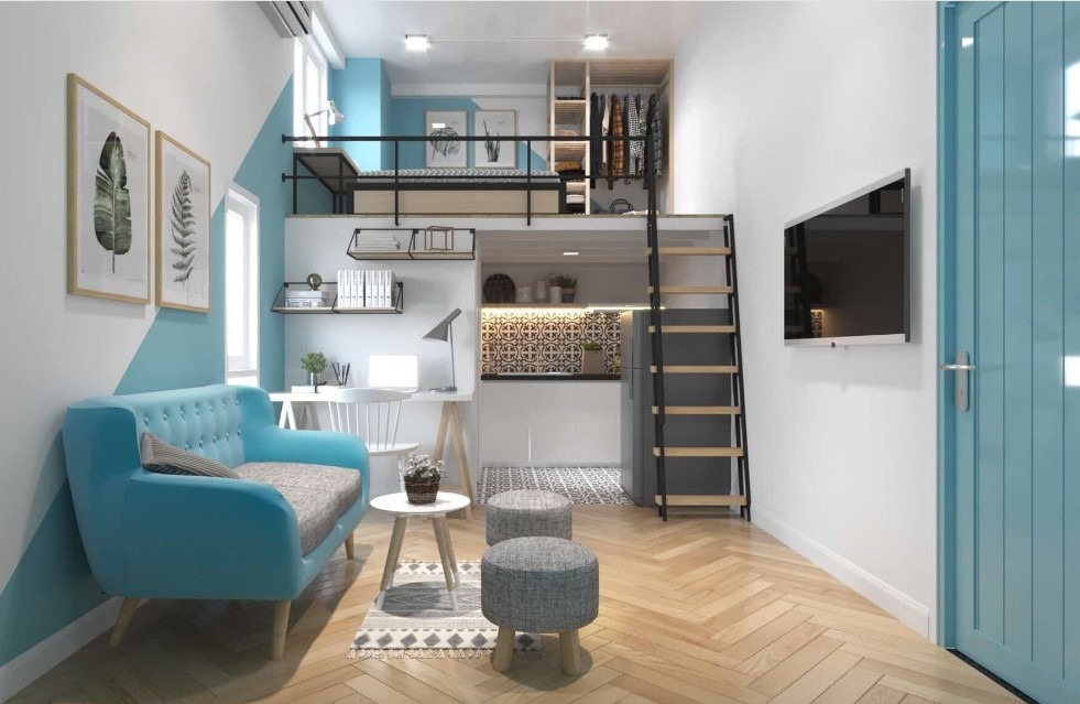 Căn hộ nhỏ với thiết kế gác lửng, sofa xanh, cầu thang gỗ, nội thất hiện đại và trang trí tinh tế.