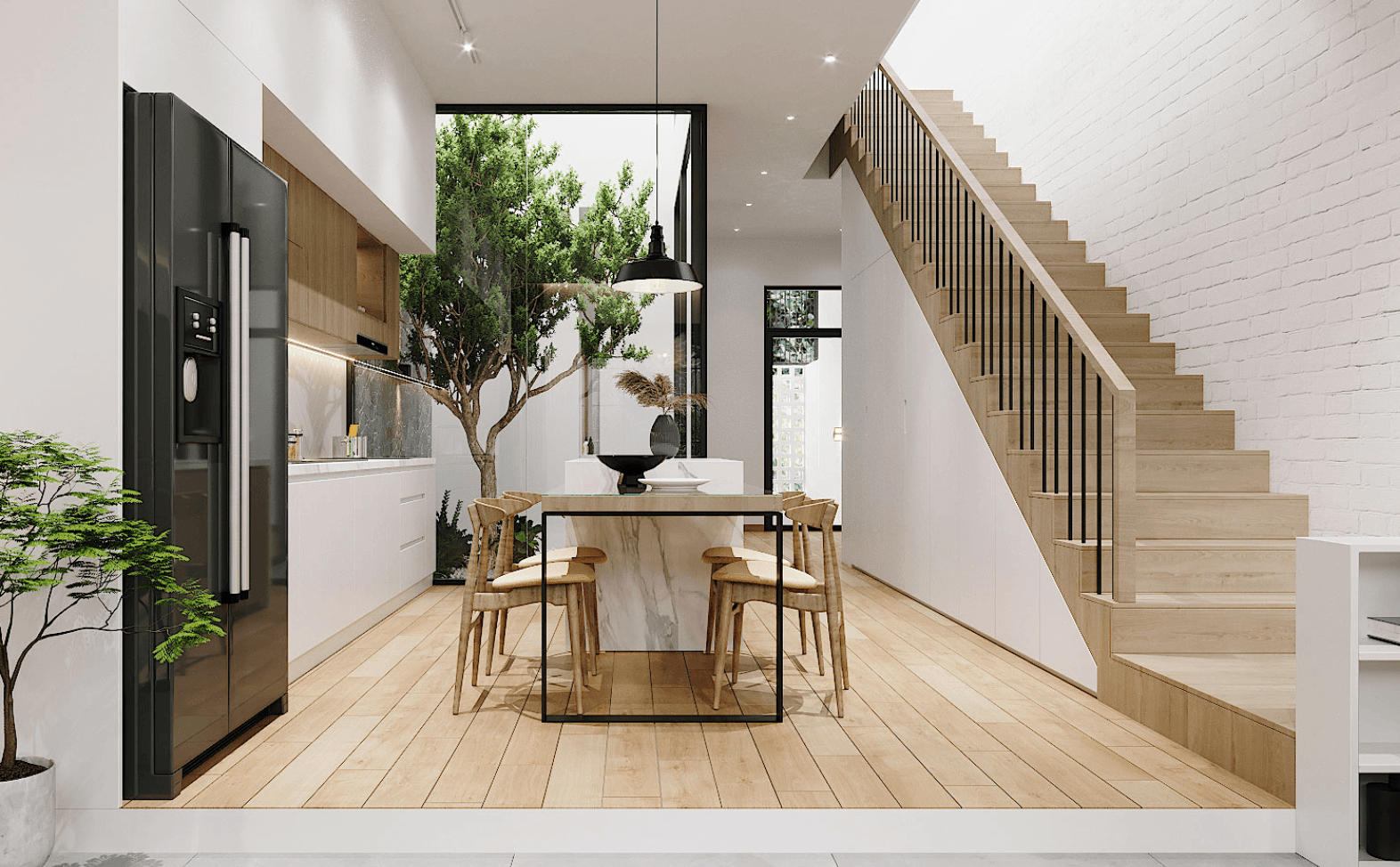 Phòng bếp hiện đại với bàn ăn, tủ lạnh, cầu thang gỗ và cây xanh, thiết kế tối giản và thoáng đãng.