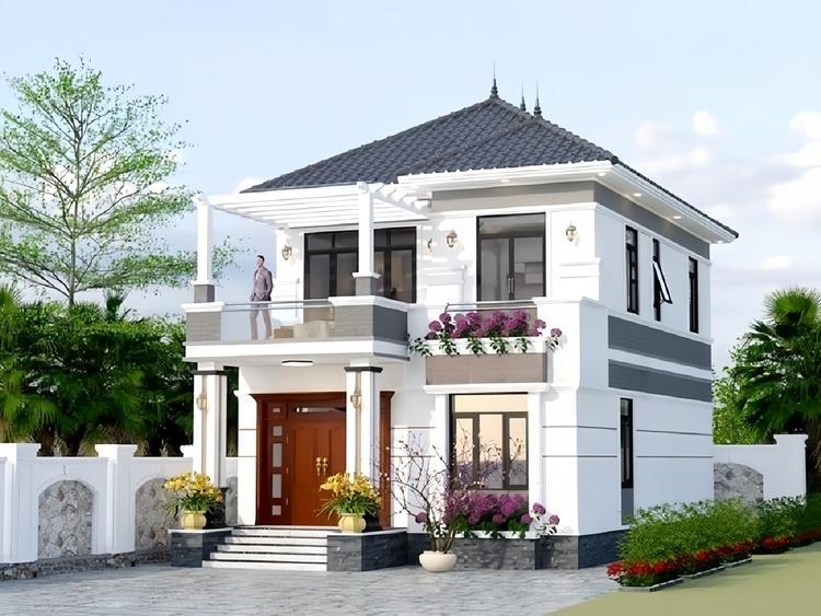 chon-mau-nha-2-tang-300-trieu-phu-hop Nhà hai tầng thiết kế hiện đại với mái ngói và ban công, xung quanh cây xanh.