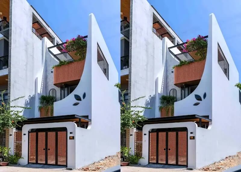 Ngôi nhà hiện đại với thiết kế góc cạnh độc đáo và cây xanh trang trí, tạo không gian sống xanh.