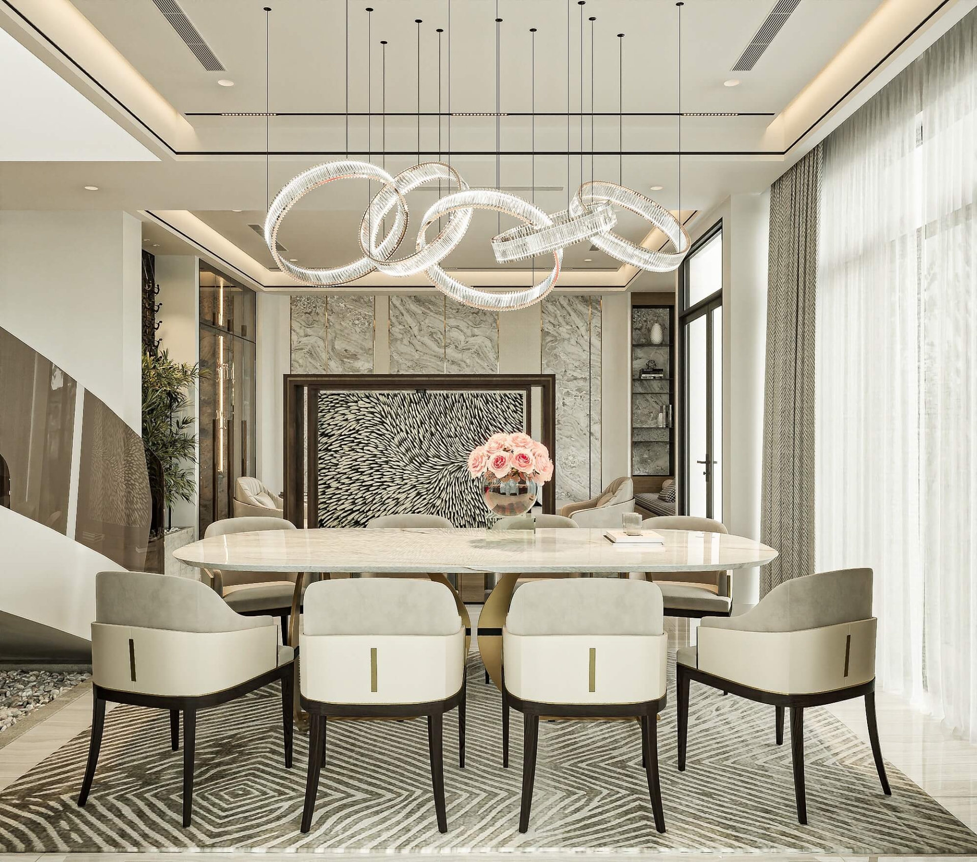 Phòng ăn sang trọng với bàn dài, ghế bọc da, đèn chùm hiện đại, và bình hoa hồng trong ánh sáng tự nhiên.