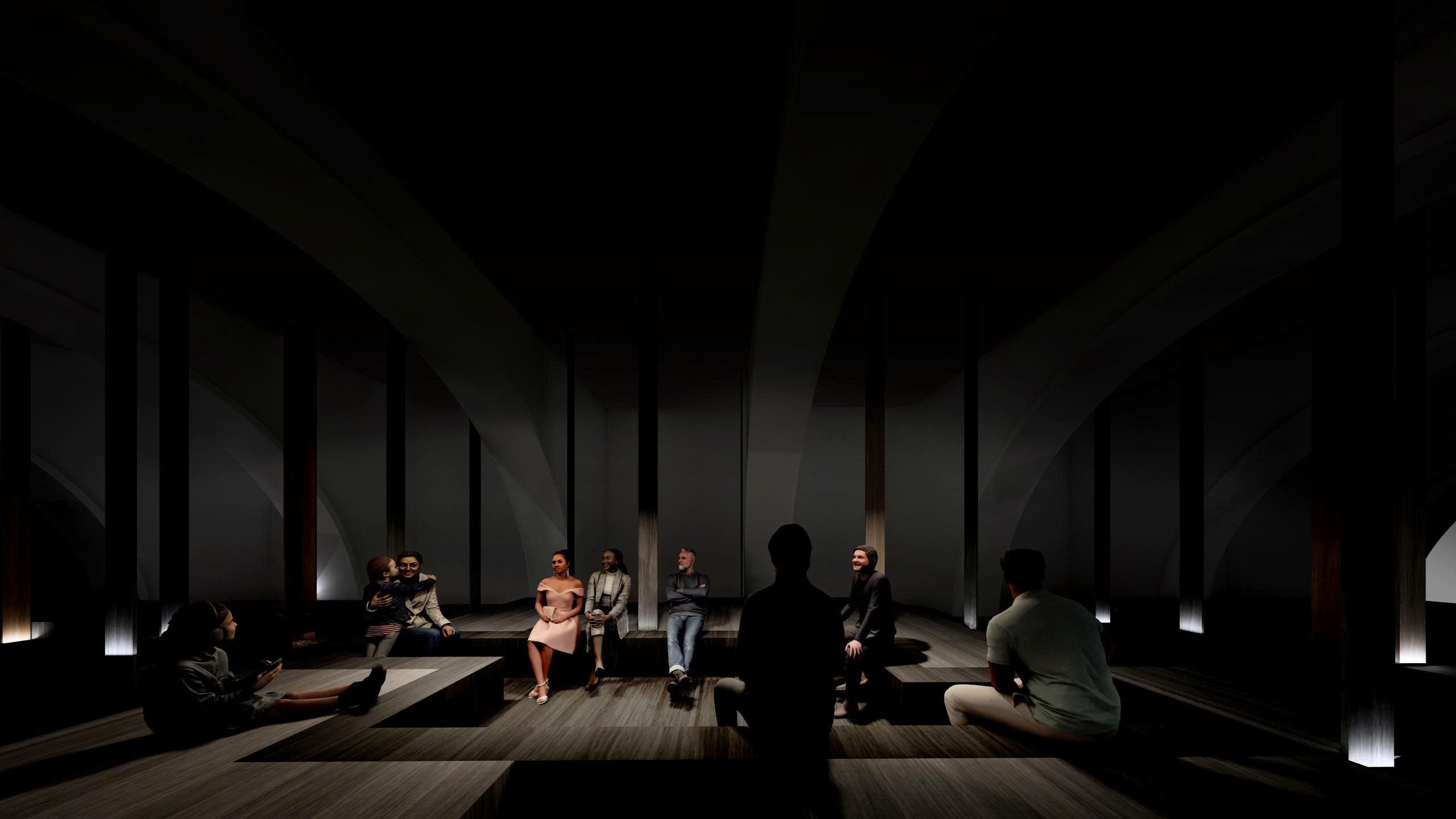 Nhóm người ngồi trò chuyện trong căn phòng tối với ánh sáng mờ, kiến trúc hiện đại và ghế bậc thang.