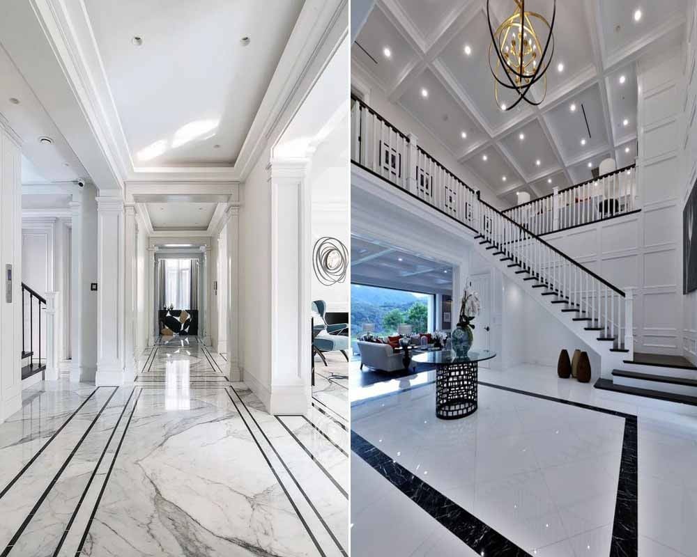 Nội thất biệt thự sang trọng với nền gạch đá hoa và cầu thang trắng nổi bật, không gian rộng rãi, ánh sáng tự nhiên.