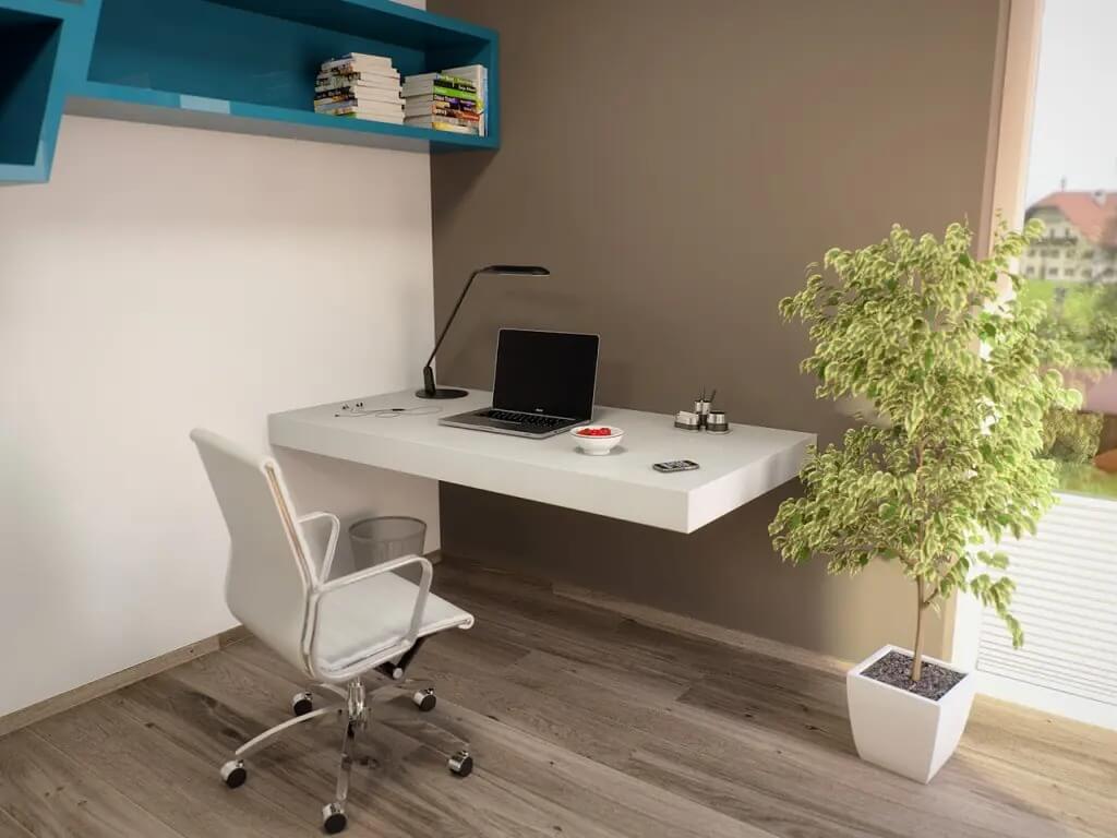 Góc làm việc hiện đại với bàn nổi, laptop, đèn bàn và ghế xoay trang nhã, cạnh cây xanh và kệ sách.