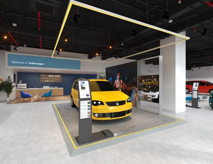 Mẫu xe Volkswagen màu vàng trưng bày trong showroom hiện đại, thiết kế ánh sáng nổi bật.