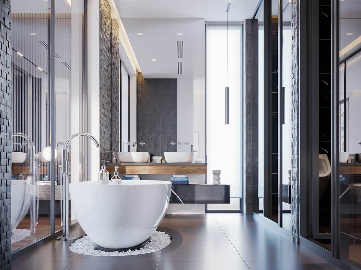 Phong tắm hiện đại với bồn tắm trắng, nội thất sang trọng và ánh sáng tự nhiên từ cửa sổ lớn.