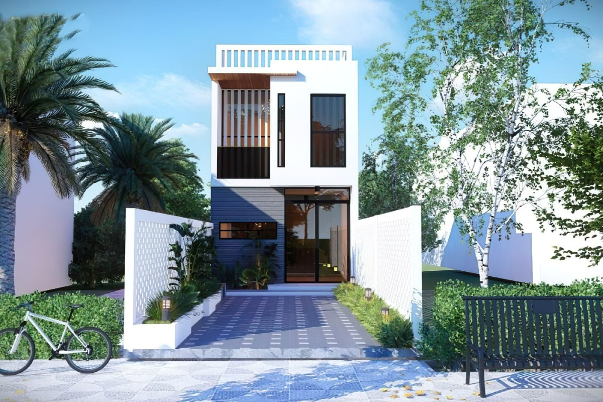 Nhà phố hiện đại với sân vườn nhỏ, lối vào lát gạch, có cây xanh và xe đạp ở trước cửa.
