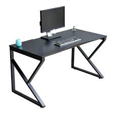 Bàn làm việc hiện đại với màn hình máy tính và bàn phím, thiết kế tối giản, chân kim loại chữ Z.