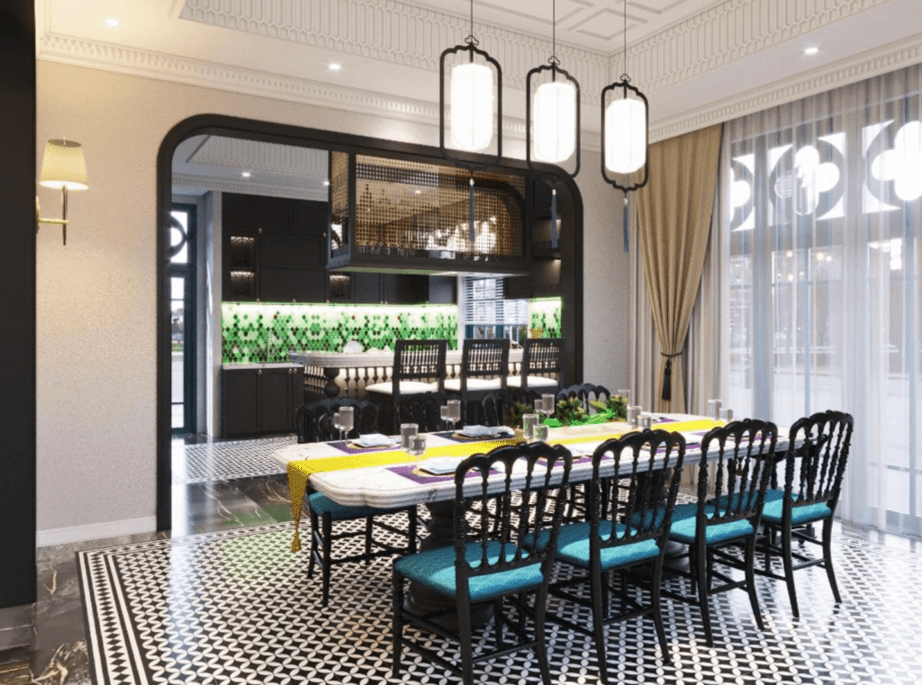 Phòng ăn sang trọng với bàn dài, ghế đệm xanh, đèn trang trí và tường bếp màu xanh nổi bật.