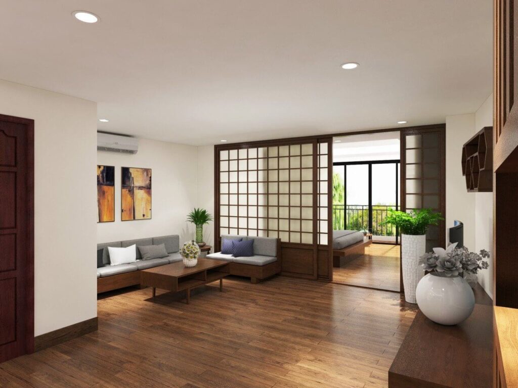 Phòng khách hiện đại với cửa sổ lớn và nội thất gỗ, cây xanh trang trí tạo không gian thoải mái và thoáng mát.