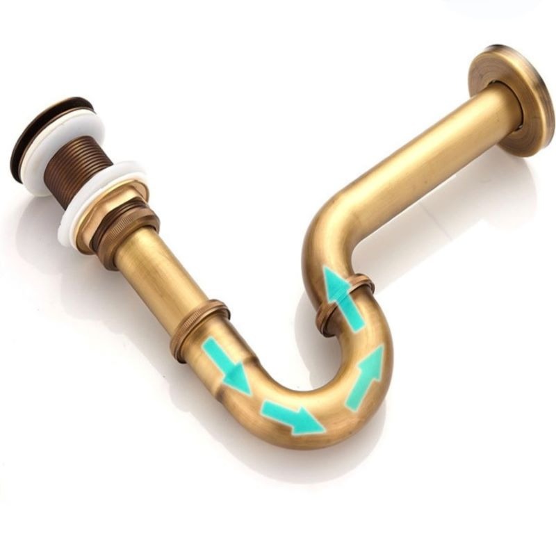 kich-thuoc-ong-xa-lavabo Ống thoát nước chữ U bằng đồng với mũi tên xanh chỉ hướng nước chảy, nền trắng.