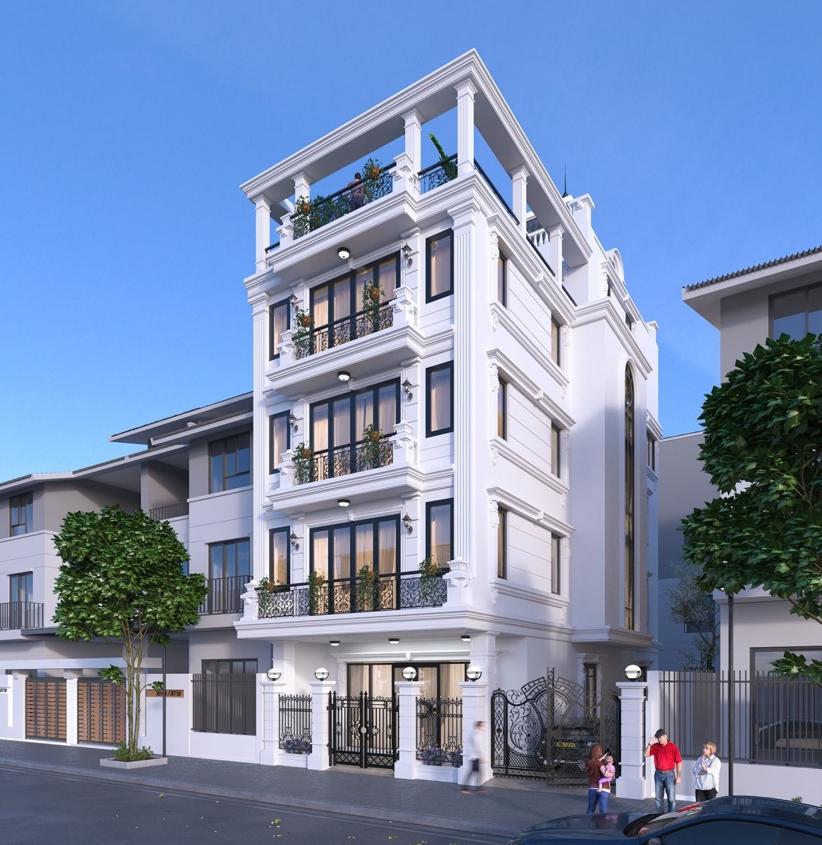 Tòa nhà trắng hiện đại 5 tầng với ban công và cây xanh, nổi bật trên nền trời xanh, có người đi ngang qua.