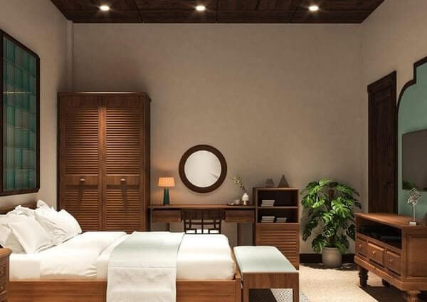 lua-chon-nha-cung-cap-noi-that-tot Phòng ngủ hiện đại với nội thất gỗ, giường, bàn trang điểm và cây xanh. Thiết kế ánh sáng ấm áp, tạo không gian thư giãn.