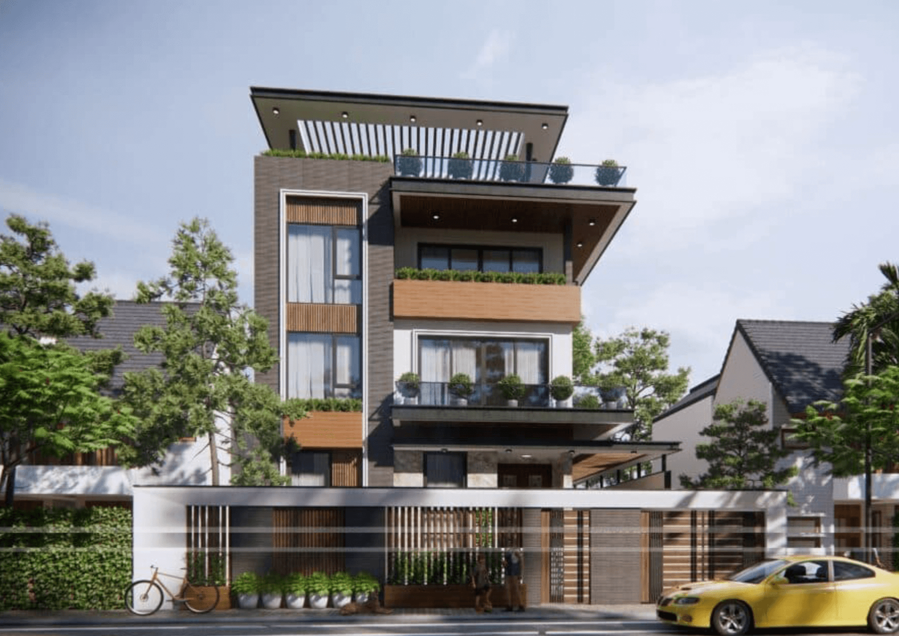 Nhà hiện đại ba tầng với ban công xanh, ô tô và xe đạp phía trước, cây xanh xung quanh.