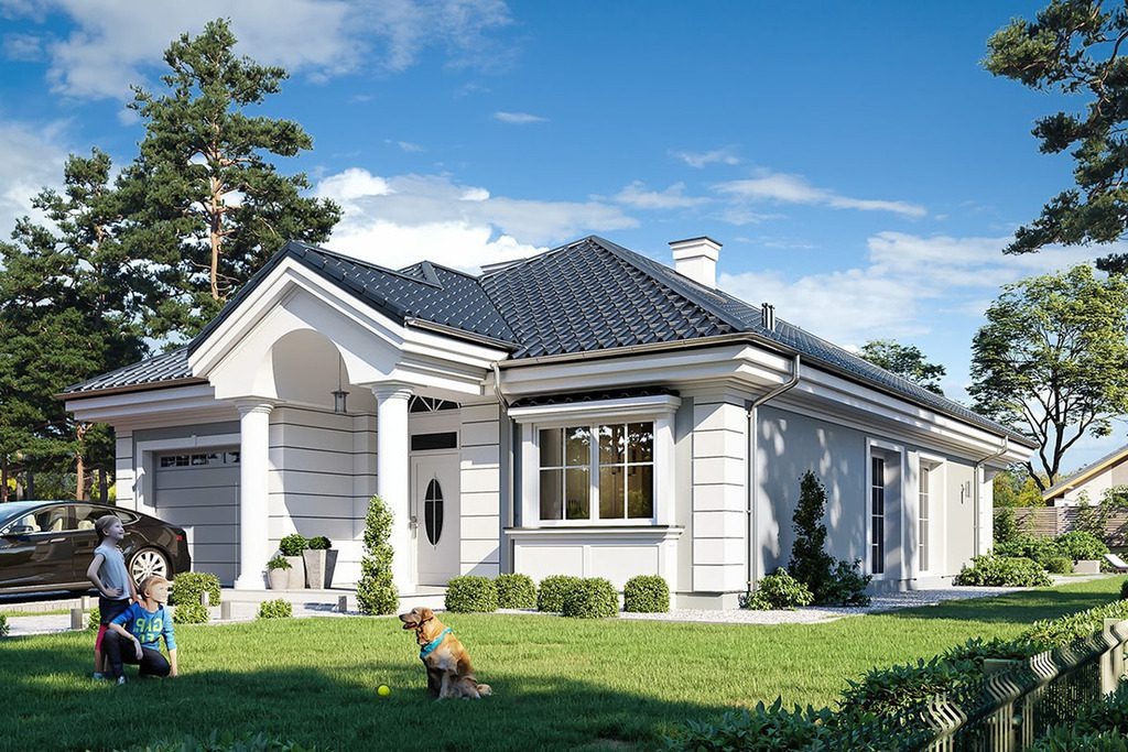 Ngôi nhà một tầng hiện đại với mái ngói xanh, vườn đẹp và cây xanh xung quanh.