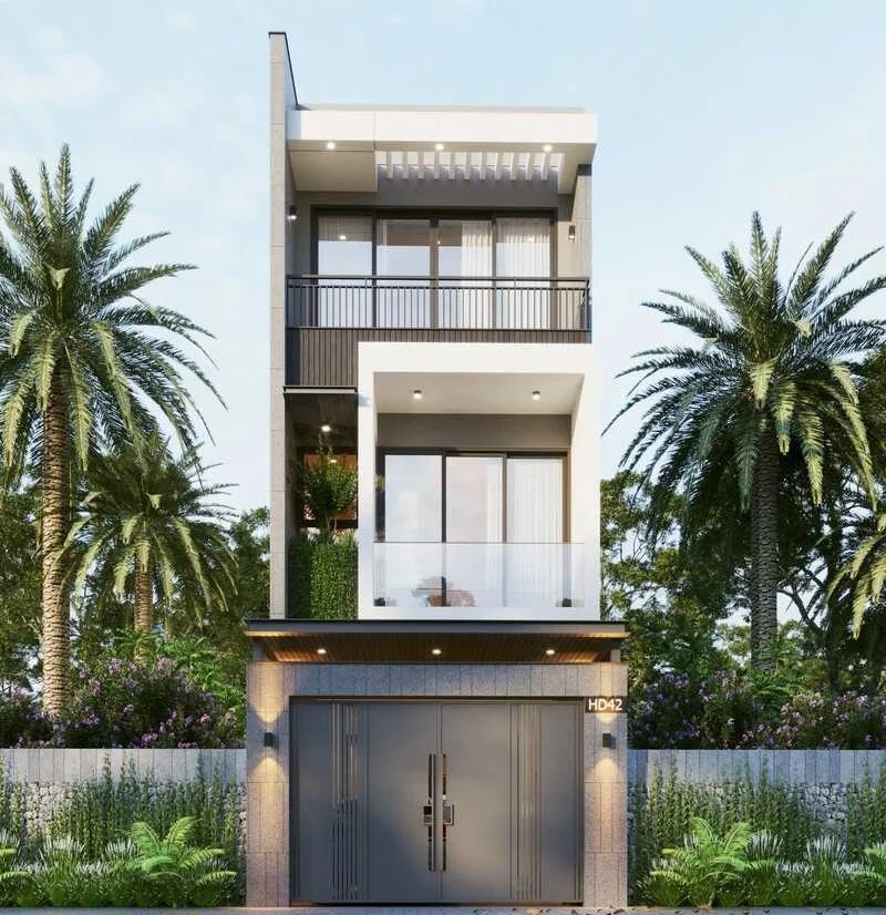 Nhà phố hiện đại ba tầng với cây cọ bên cạnh, thiết kế cửa kính và ban công thanh lịch.