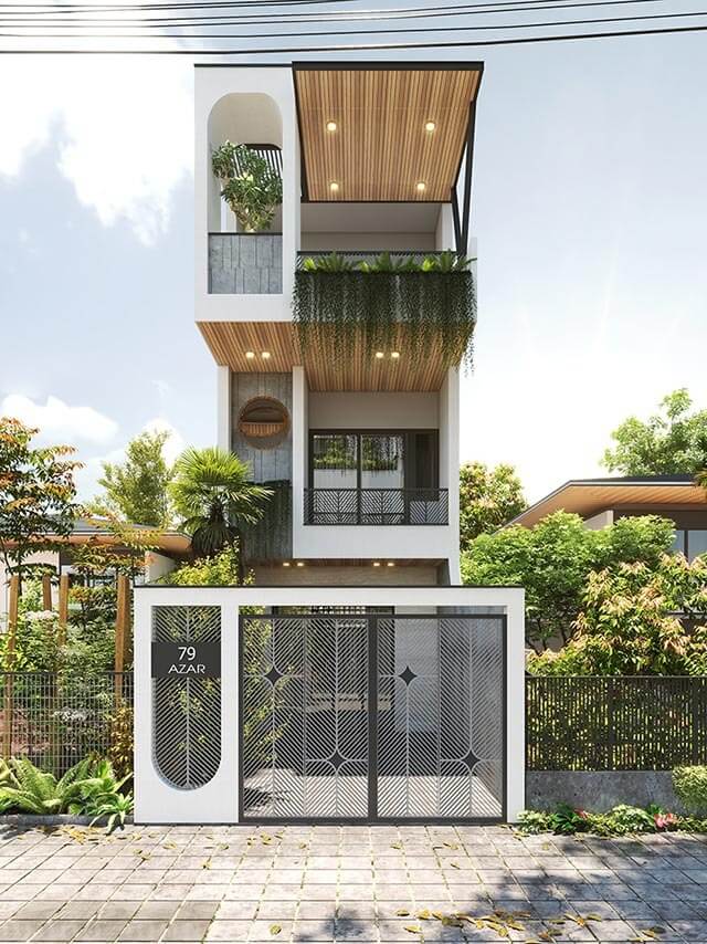 Nhà 3 tầng hiện đại với cây xanh, ban công gỗ, và cổng kim loại, mang phong cách kiến trúc đương đại.