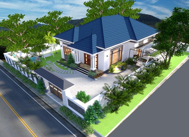 Nhà vườn hiện đại với mái ngói xanh lam, sân rộng, nhiều cây xanh tươi mát tại khu vực ngoại ô yên tĩnh.