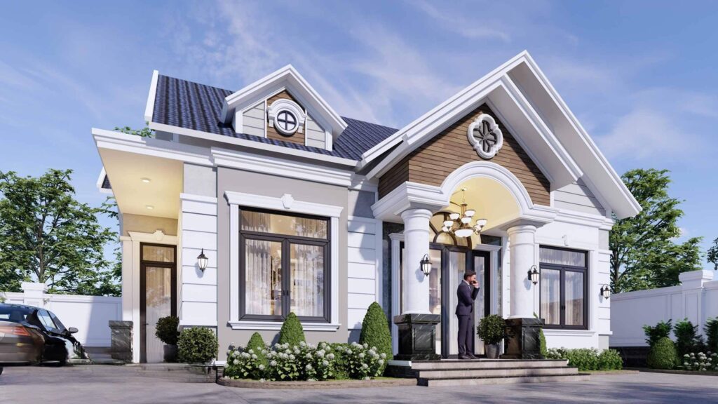 Biệt thự một tầng sang trọng với mái thái và cổng vòm lớn, cây xanh xung quanh trong ngày nắng đẹp.