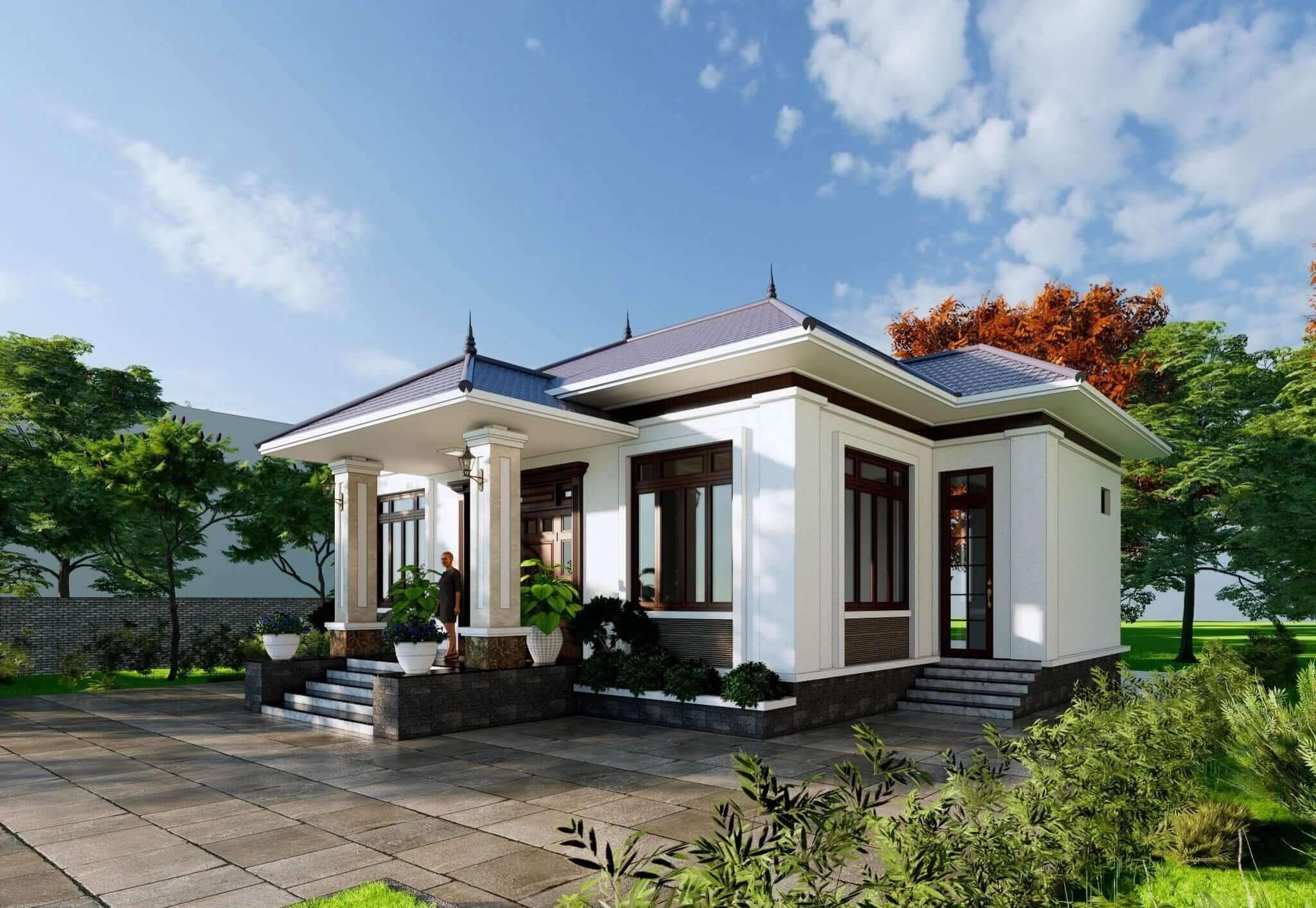 mau-nha-cap-4-dep-100m2-gia-biet-thu-4 Nhà mái thái hiện đại, sân rộng với cây xanh, trời xanh không mây.