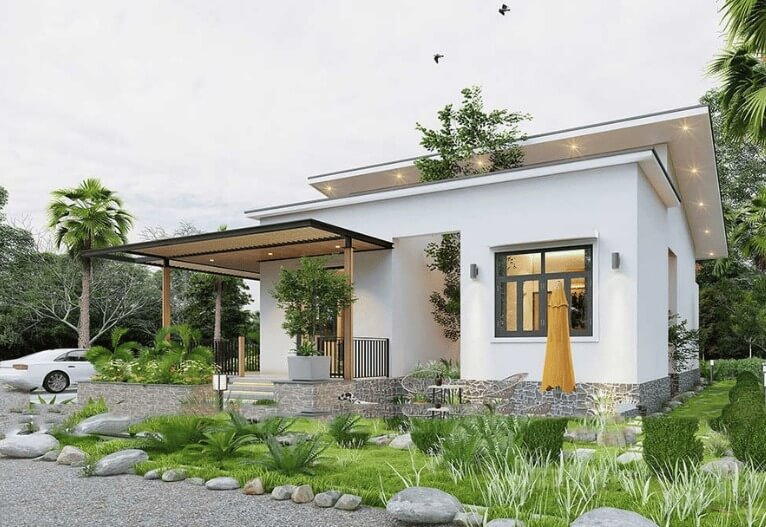 Nhà vườn hiện đại với mái chéo, cây xanh xung quanh tạo không gian thoáng đãng, ô tô đậu bên phải.