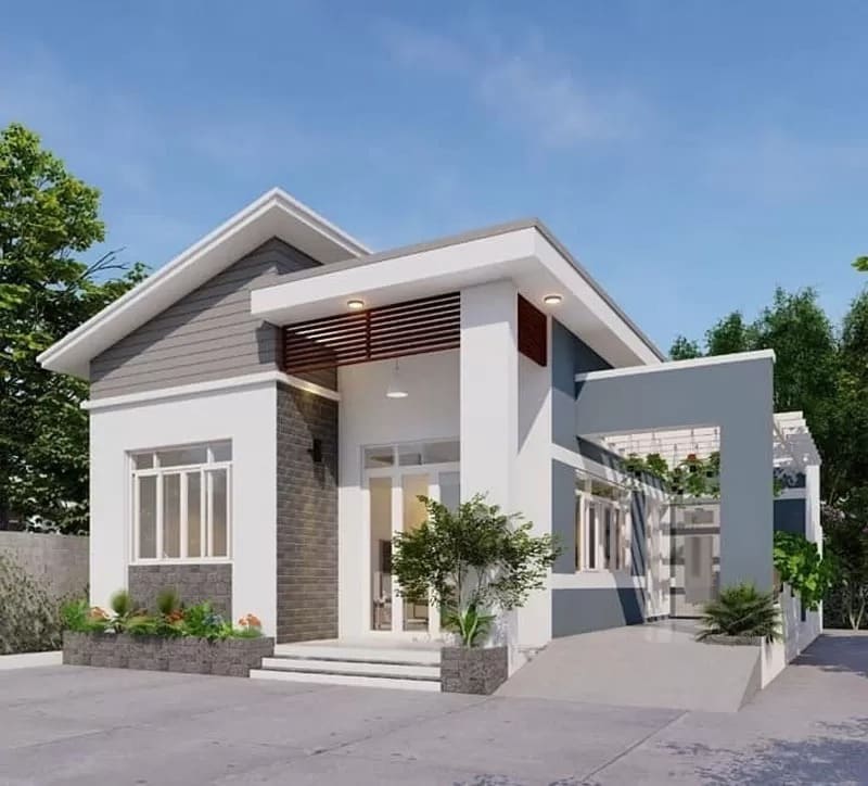 Nhà cấp 4 hiện đại với mái chữ A, cửa kính lớn, bên ngoài có cây xanh, không gian thoáng đãng buổi sáng.