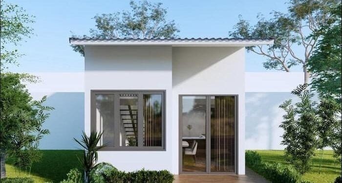 Nhà cấp 4 hiện đại với sân vườn xanh, thiết kế tối giản, cửa kính lớn, ánh sáng tự nhiên, không gian thoáng đãng.