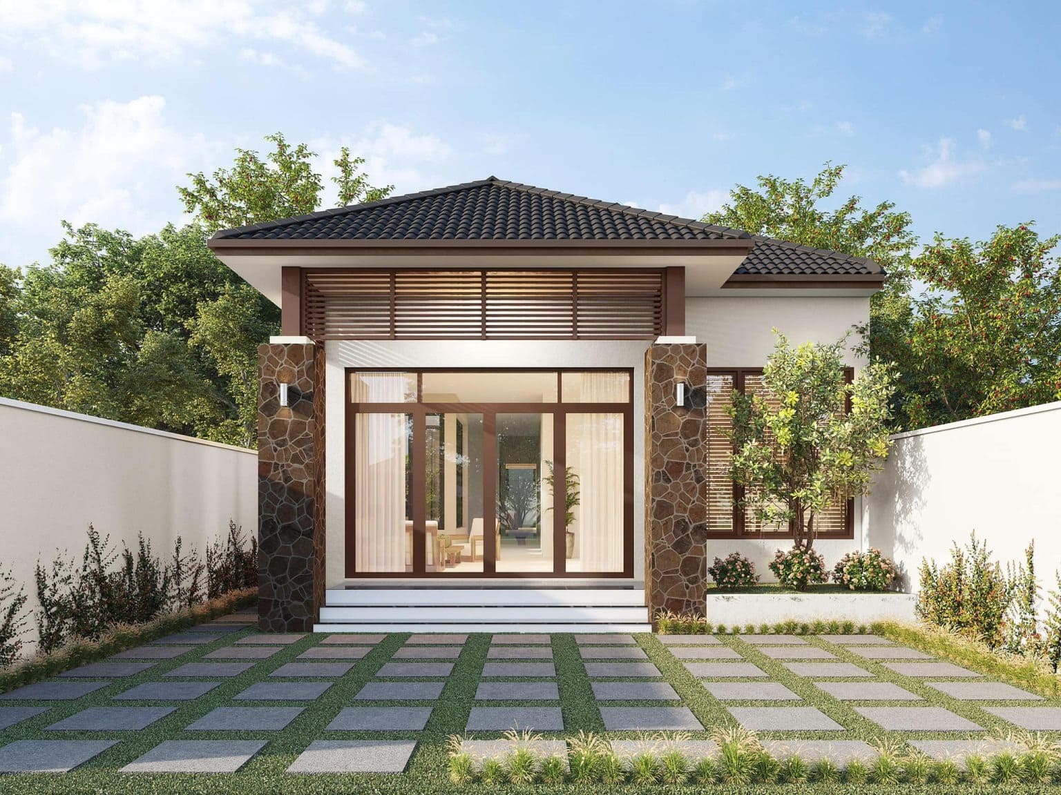 Nhà cấp 4 hiện đại với mái ngói đen, cửa kính lớn, và sân vườn rộng, xung quanh là cây xanh và bức tường trắng.