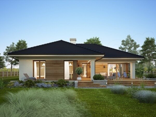 Ngôi nhà hiện đại rộng rãi với mái đen, sân vườn xanh đẹp, thiết kế tối giản giữa khung cảnh thiên nhiên.