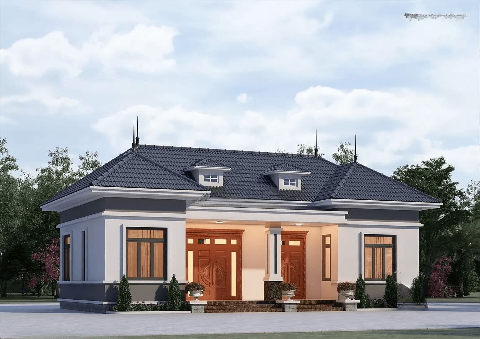 Nhà cấp 4 mái Nhật đẹp với mái ngói xanh, cửa gỗ sang trọng, sân rộng rãi, xung quanh là cây cối xanh tươi.