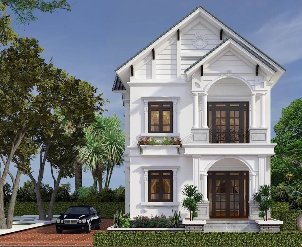 Biệt thự trắng hiện đại giữa vườn xanh với ô tô đỗ gần lối đi, kiến trúc nổi bật và cửa sổ lớn.