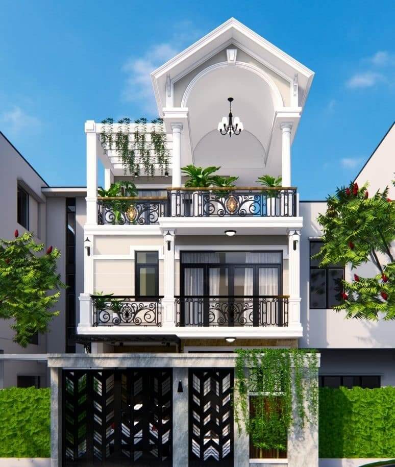 Nhà phố ba tầng hiện đại có ban công rộng và cây xanh trang trí, bầu trời xanh ngắt ở phía trên.