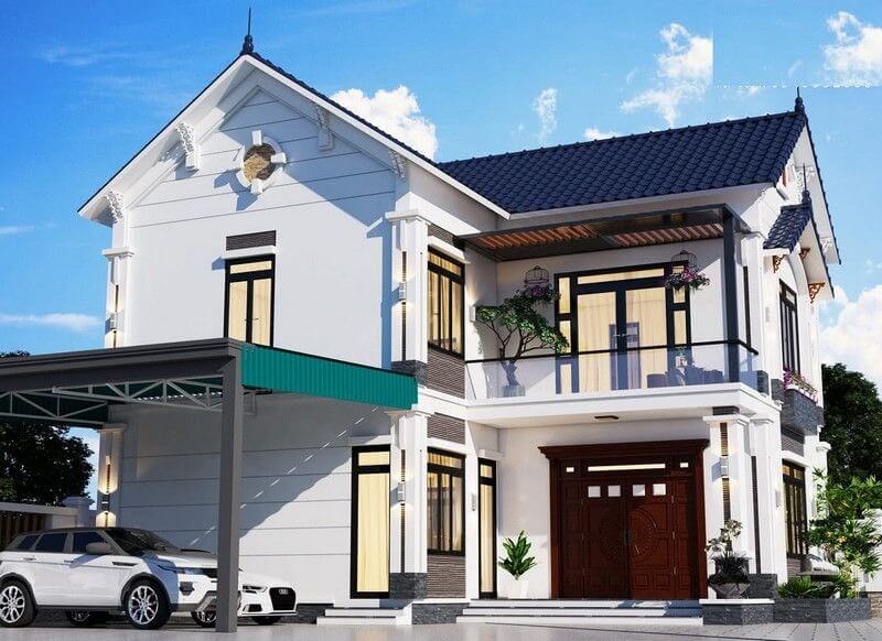 mau-nha-ong-2-tang-hinh-chu-l-3 Nhà hai tầng mái ngói màu xanh, thiết kế hiện đại với ban công và gara ô tô.