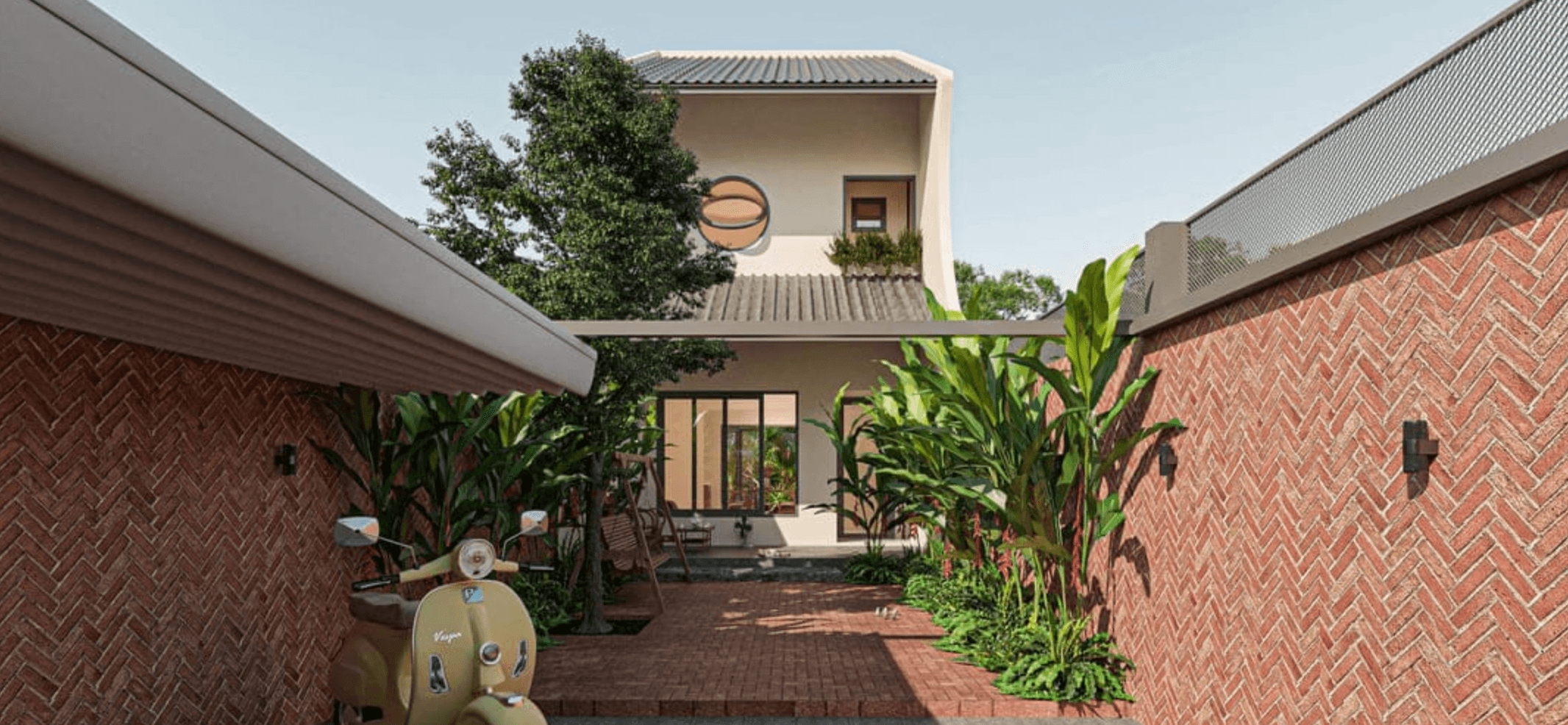 Ngôi nhà hiện đại với sân gạch và cây xanh, tường gạch đỏ, tạo không gian thoáng đãng và gần gũi thiên nhiên.
