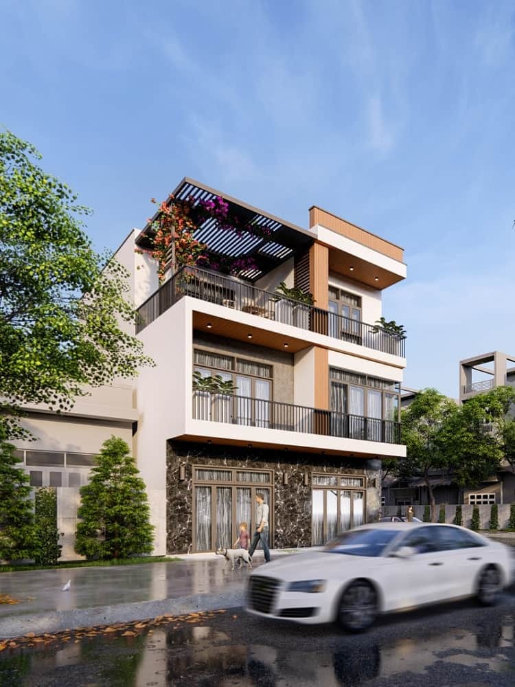 Nhà phố hiện đại ba tầng với sân thượng xanh, người đi bộ và xe hơi trên đường ướt sau mưa.