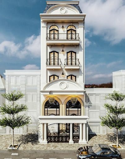 Tòa nhà kiến trúc cổ điển, 4 tầng với cổng sắt mỹ nghệ, mặt tiền đường phố, cây xanh hai bên.