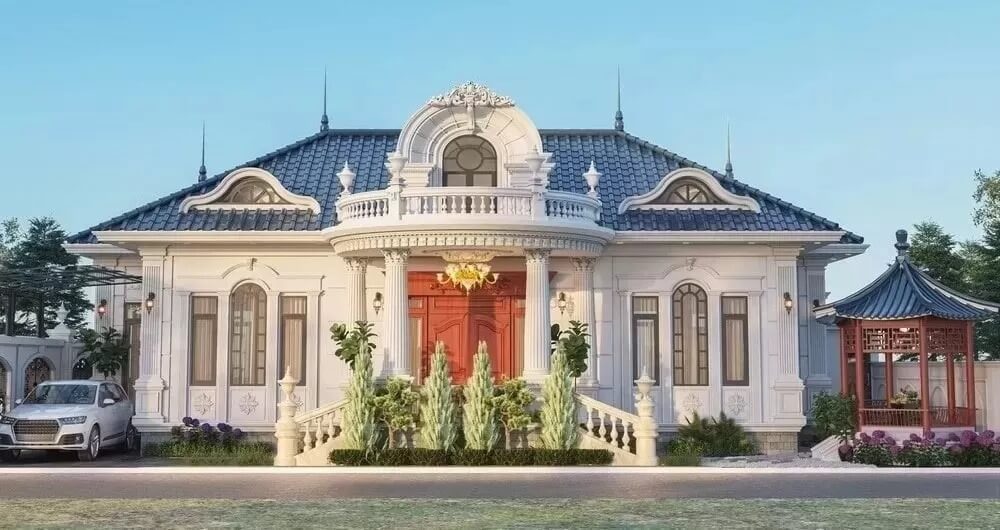 mau-nha-vuon-100m2-phong-cach-phap-5 Biệt thự cổ điển rộng lớn với mái xanh, cổng đỏ nổi bật và sân vườn thoáng đãng.