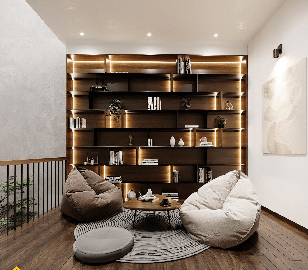Phòng khách hiện đại với ghế túi, bàn tròn, và kệ sách gỗ tối màu có đèn LED trang trí.