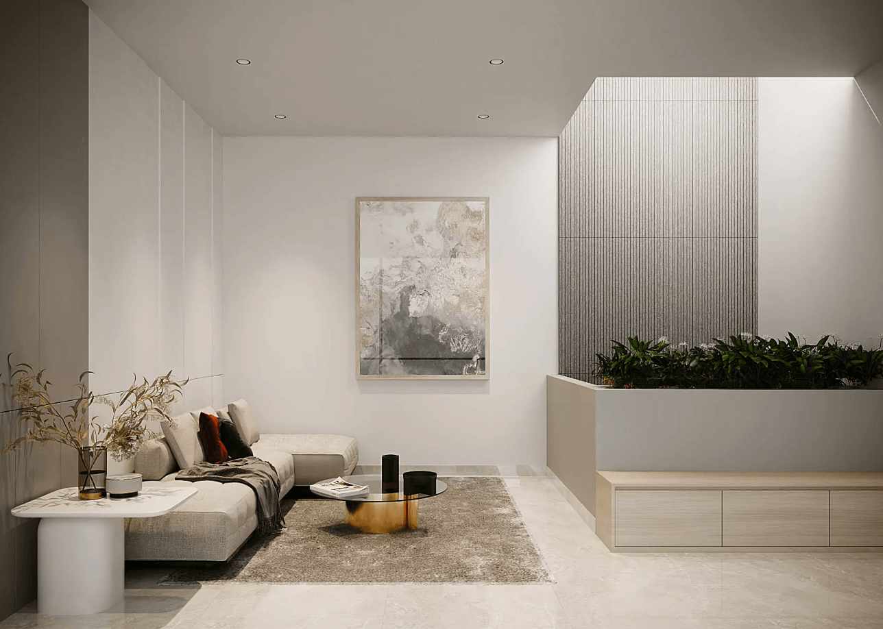 Phòng khách hiện đại với sofa xám, bàn kính, tranh treo tường lớn và cây xanh trang trí.