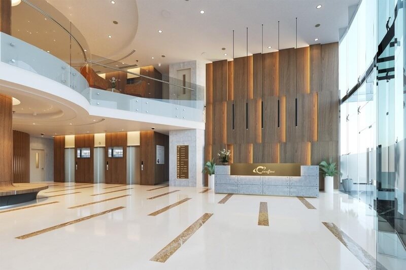 Sảnh tiếp tân hiện đại với nội thất gỗ và ánh sáng tự nhiên, tạo không gian sang trọng và rộng rãi.