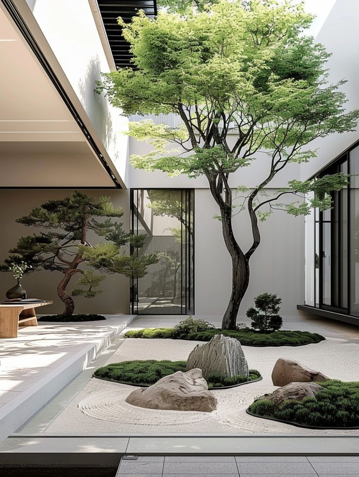 Sân vườn thiền Nhật Bản với cây xanh, đá và cát, tạo không gian yên bình và thư giãn.