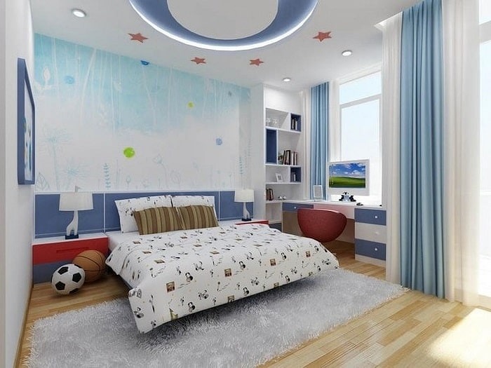 Phòng ngủ trẻ em hiện đại với giường đôi, tường xanh, bàn học và trang trí sáng tạo.