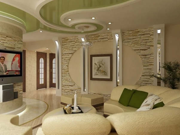 Phòng khách hiện đại với sofa tròn màu kem, tường đá trang trí và trần nhà thiết kế độc đáo.