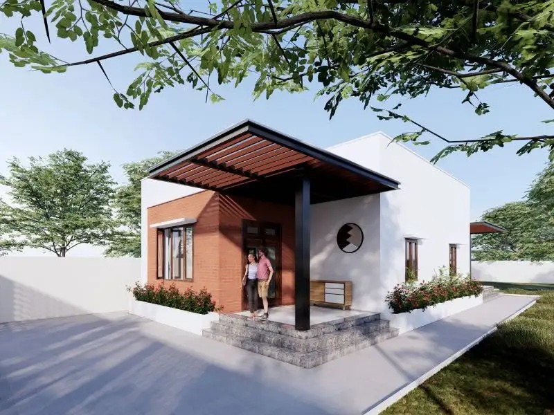 Nhà cấp bốn hiện đại với tường gạch và mái hiên, có cây xanh xung quanh.